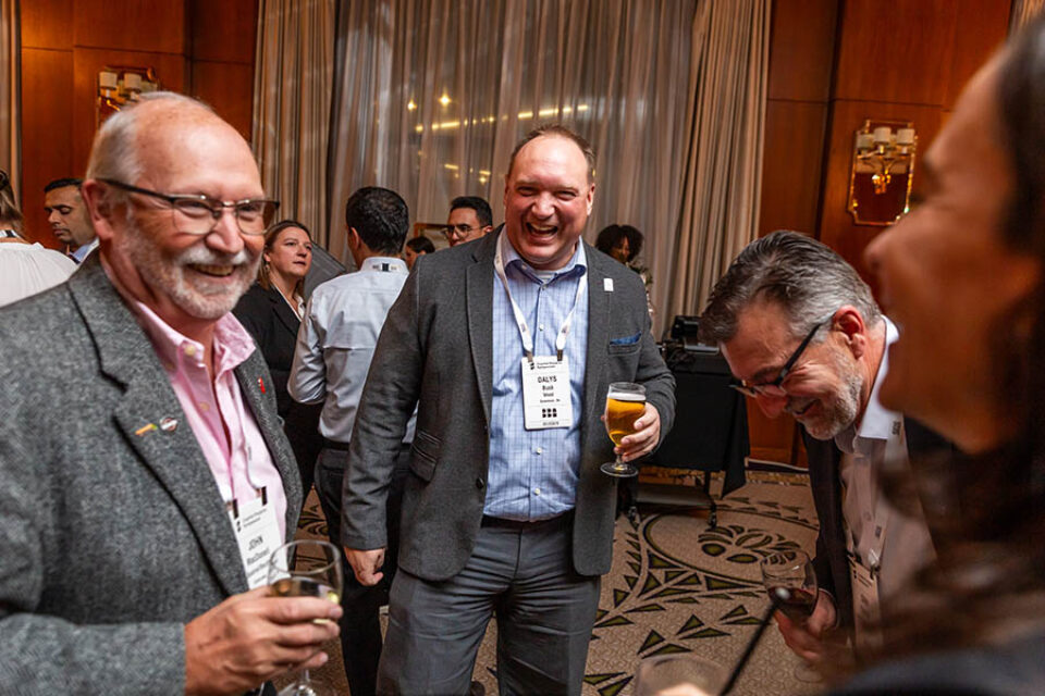 Event delegates share a joke