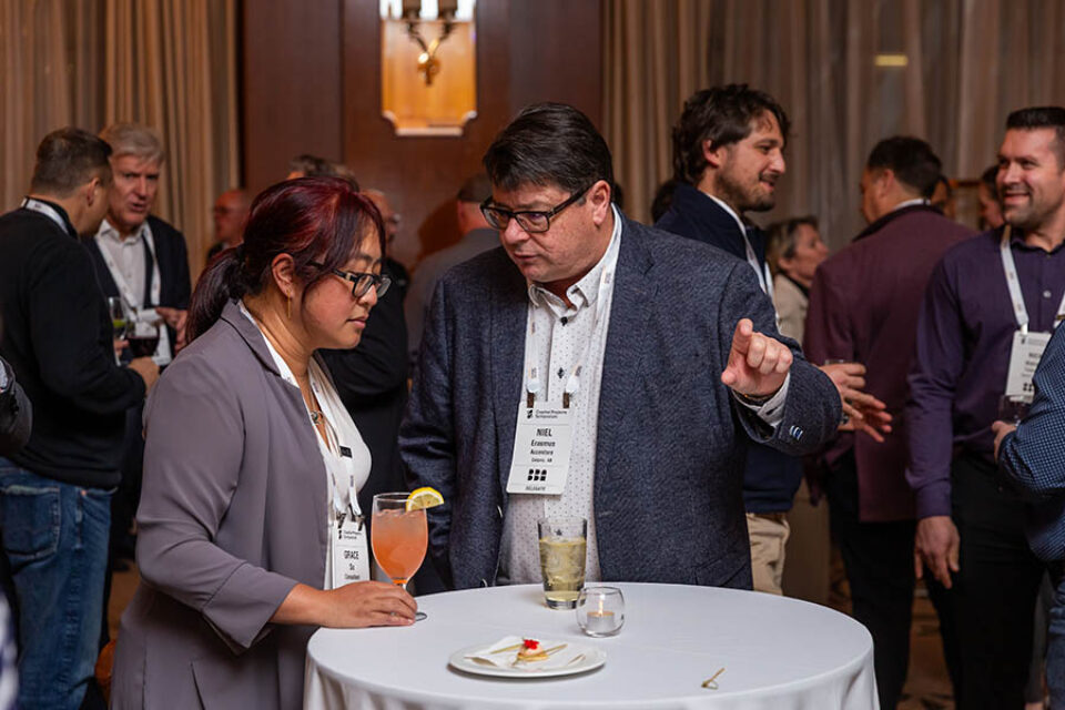 Guests talking at evening reception