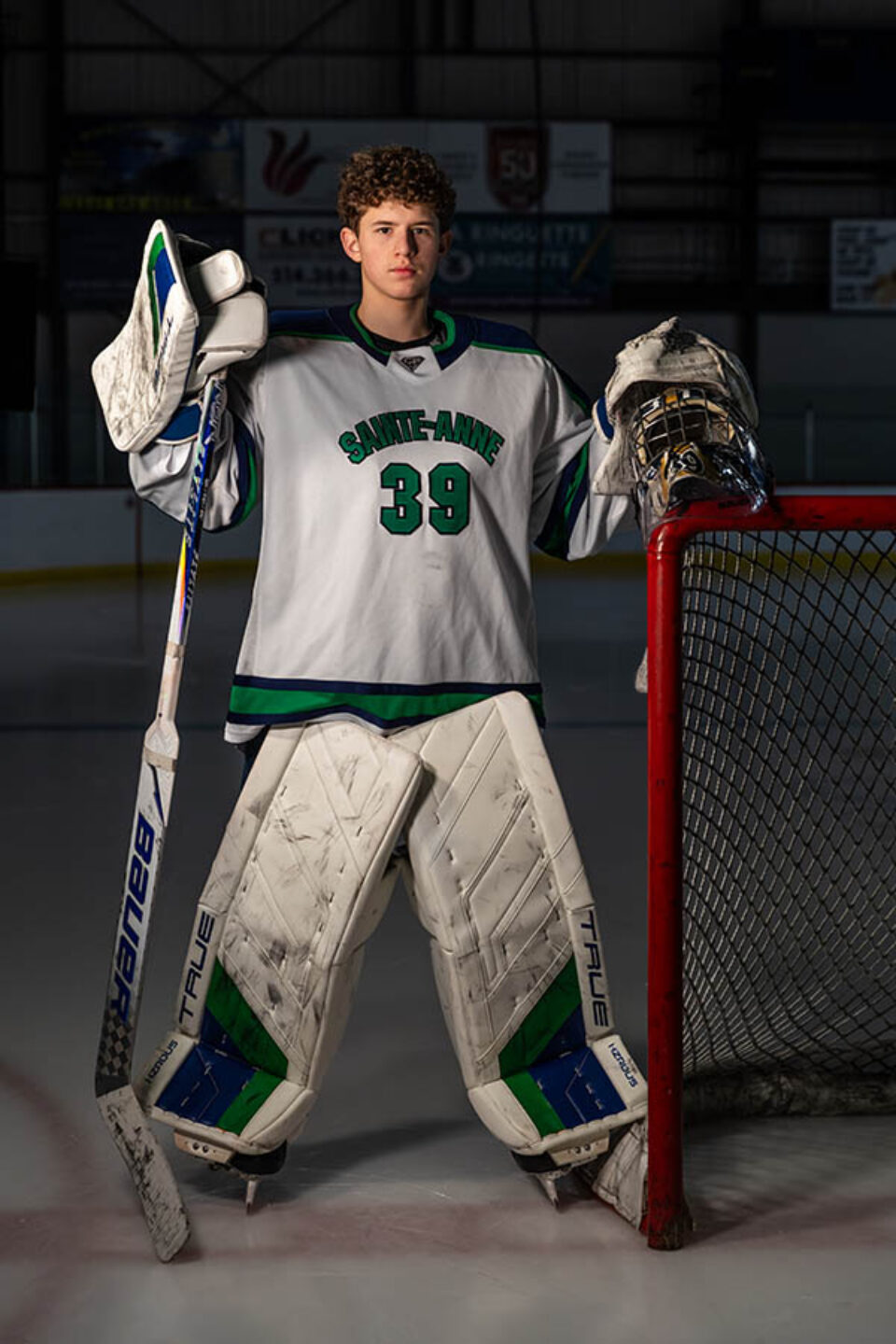 Hockey goalkeeper portrait taken by Montreal college sports photographer for marketing materials
