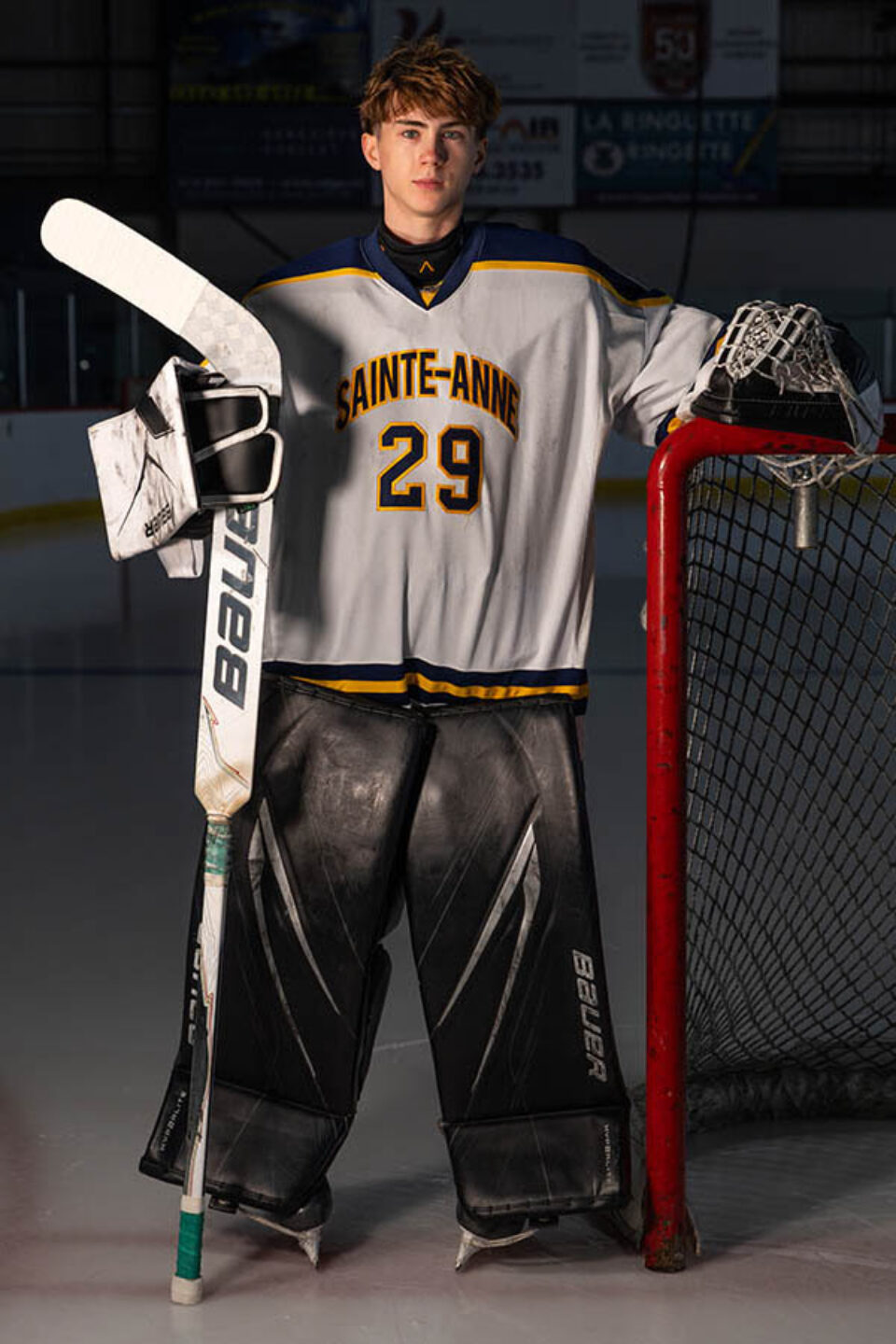 Portrait of hockey team goalkeeper by Montreal college sports photographer
