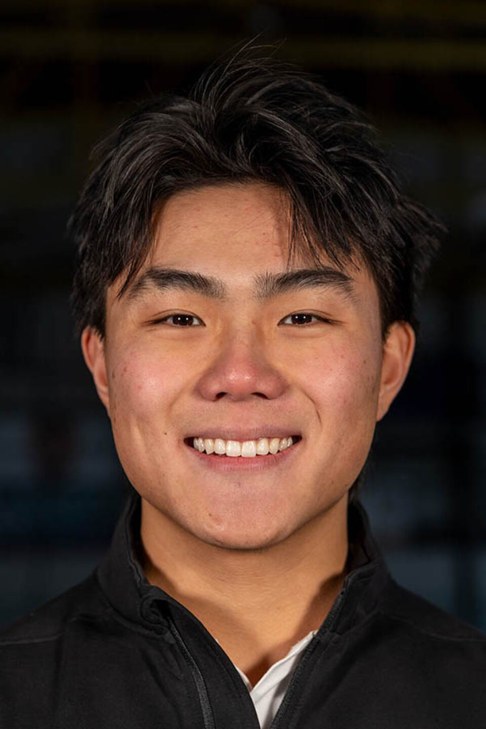 College hockey coach headshot by Montreal college sports photographer