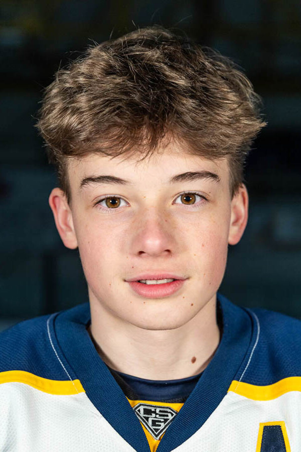 Hockey headshot for marketing materials by Montreal college sports photographer