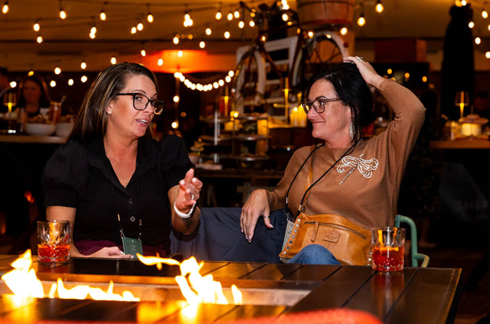 Women enjoy business networking at a corporate event in Laval