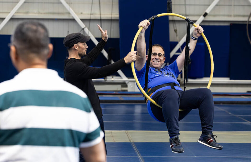 Man on aerial hoop