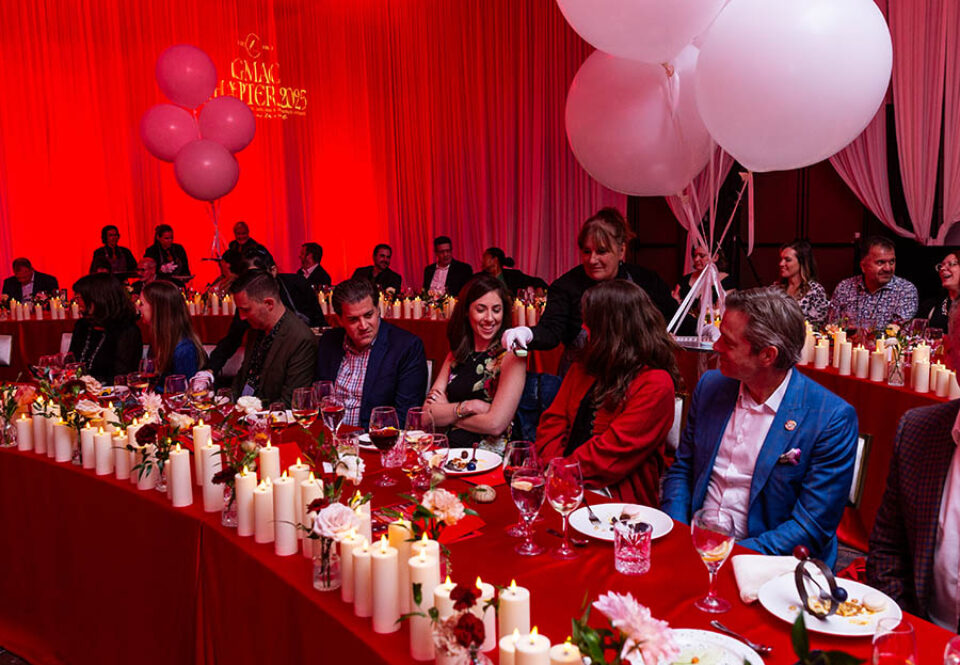 Gala dinner guests served floating desert, by a Laval event photographer