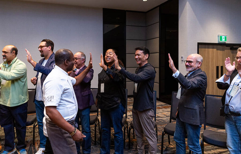 End of conference clap line, Laval event photography
