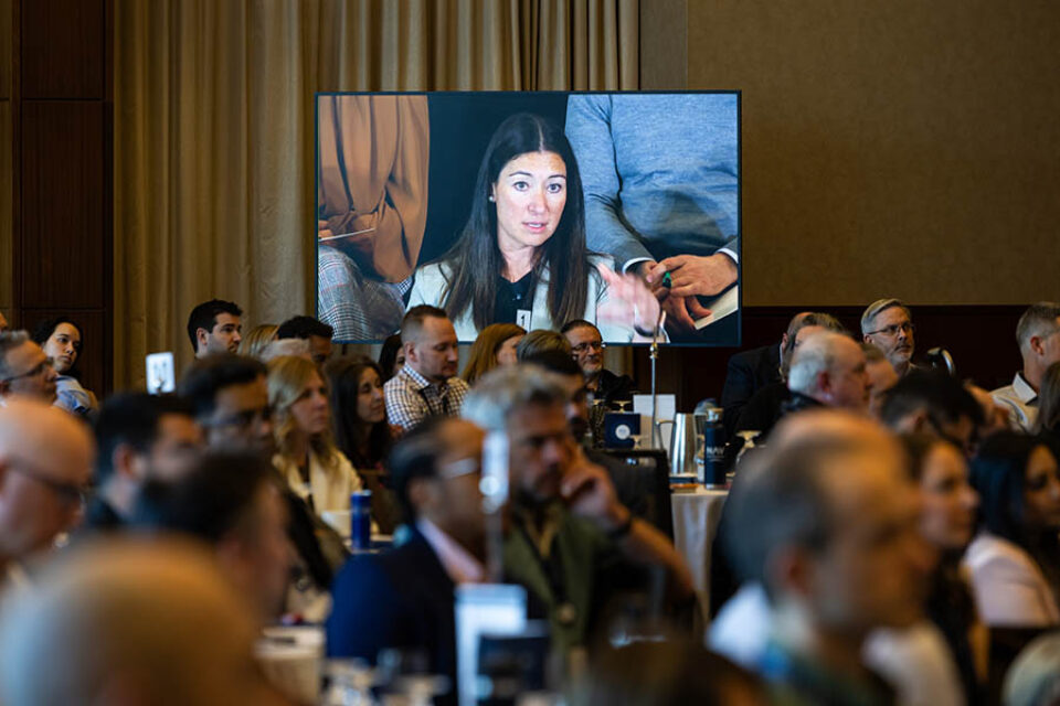 Event speaker shown on screen